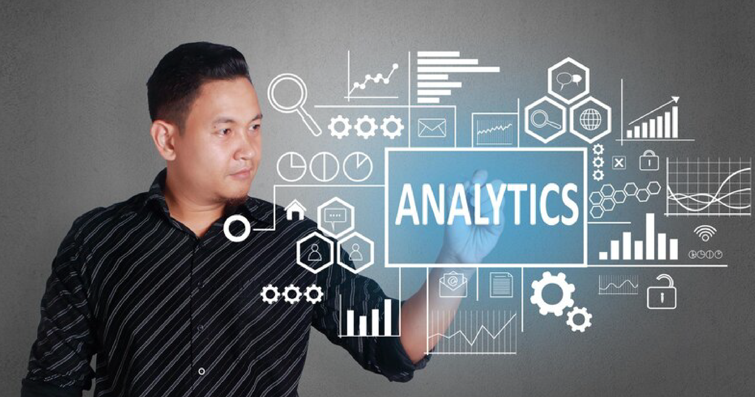 A person is analyzing data on a screen, working through detailed analytics.