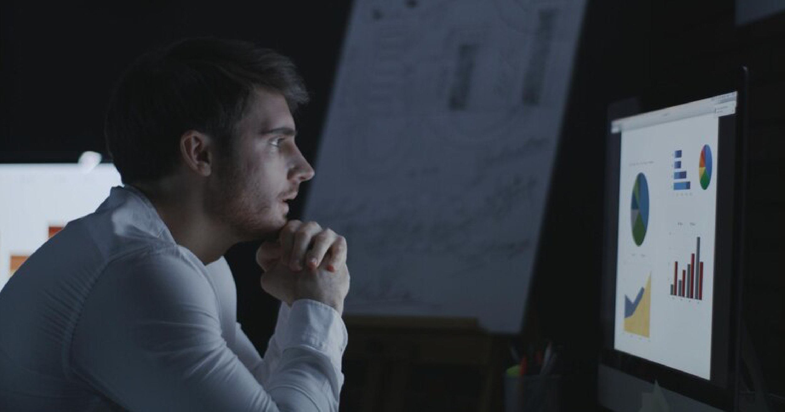A person is analyzing marketing analytics on their screen, reviewing data insights to guide their strategy.
