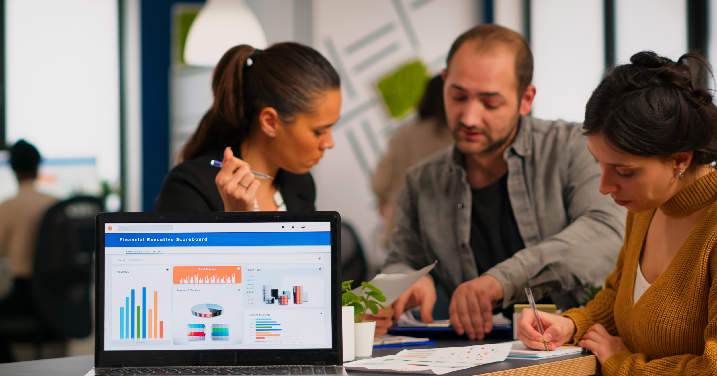Three people working on SEO
